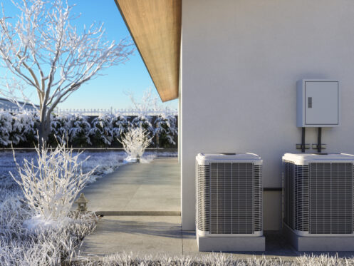 AC unit in snowy garden
